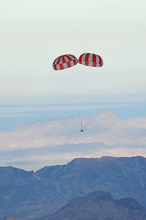 The Orion Crew Exploration Vehicle (CEV) Parachute Assembly System (CPAS) performed a successful airdrop test shortly after sunrise on July 27, 2010, at the US Army Yuma Proving Grounds in Arizona. The primary test objectives were 1) to measure the performance of a two drogue parachute cluster with one drogue skipping the second of two reefing stages and 2) to measure the performance of a two main parachute cluster with modified suspension line and riser lengths matching the Apollo configuration ratio. The test platform consisted of a pallet and weight tub and was extracted from a C-130 aircraft at 17,500 ft. The two drogue parachutes were deployed and performed nominally. The two main parachutes were deployed and also performed nominally but one parachute experienced a higher inflation load than expected during reefing stages. Both of the primary test objectives were successfully met. The test platform and all parachutes were successfully recovered and returned to the CPAS hangar in the city of Yuma. Steady descent under main chutes.